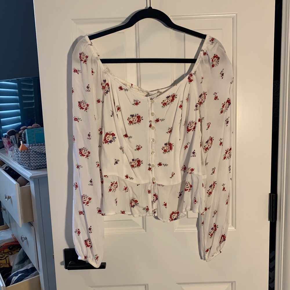 White and red floral blouse